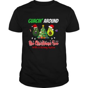 Guacin around the Christmas tree with 2KK shirt